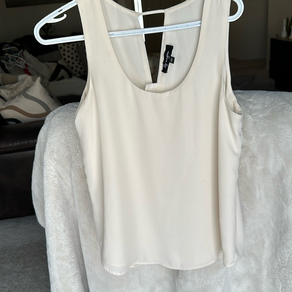 Size small cream blouse, flattering style, double lined